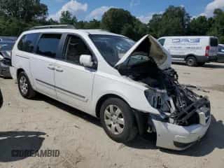 2008 Hyundai Entourage GLS z VIN KNDMC233886052544, wystawiony jako Copart lot #65808295 z przebiegiem Nie podano mil oraz Szkoda całkowita • Salvage title. Historia ofert i sprzedaży dostępna na DreamBid. Obrazek 4.