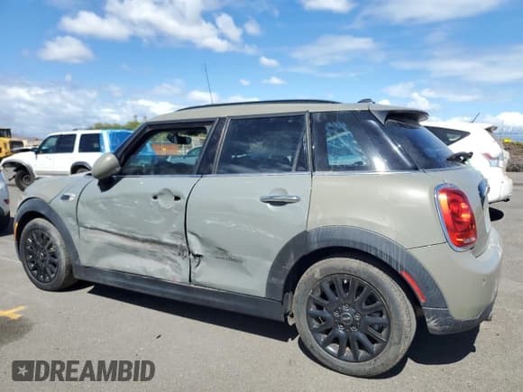 ✅ 2019 MINI Hardtop 4 Door Cooper • VIN: WMWXU1C53K2F82506 • Лот: 81157225. Опубликован ранее на Copart с пробегом 35 759 миль. Бесплатный доступ к архиву аукционных продаж из США и подробный отчёт об истории автомобиля на DreamBid. Изображение 2.