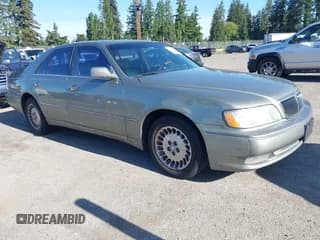 ✅ 2001 Infiniti Q45 Touring • VIN: JNKBY31A41M100704 • Lot: 42346520. Wystawiony na IAAI z przebiegiem 73 073 mil. Bezpłatny archiwum sprzedaży aukcyjnych z USA i szczegółowy raport historii pojazdu na DreamBid. Zdjęcie 1.