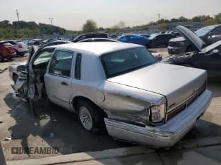 ✅ 1996 Lincoln Town Car Executive • VIN: 1LNLM81W4TY707168 • Lot: 70587254. Listed on Copart with Not provided. Free auction sales archive from the USA and detailed vehicle history report at DreamBid. Image 2.
