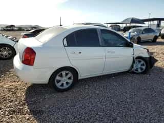 2006 Hyundai Accent GLS z VIN KMHCN46C76U019505, wystawiony jako Copart lot #55410014 z przebiegiem 261 119 mil mil oraz Szkoda całkowita • Salvage title. Historia ofert i sprzedaży dostępna na DreamBid. Obrazek 3.