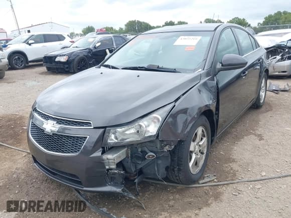 ✅ 2014 Chevrolet Cruze 1LT • VIN: 1G1PC5SB4E7195142 • Lot: 43022219. Listed on IAAI with 148,506 mi. Free auction sales archive from the USA and detailed vehicle history report at DreamBid. Image 2.