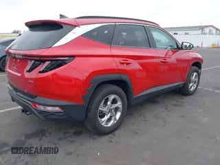 2022 Hyundai Tucson SEL z VIN 5NMJBCAE8NH054681, wystawiony jako IAAI lot #43193682 z przebiegiem 33 510 mil mil oraz . Historia ofert i sprzedaży dostępna na DreamBid. Obrazek 4.