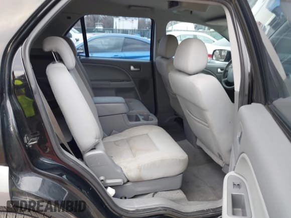 ✅ 2005 Ford Freestyle SEL • VIN: 1FMZK051X5GA35853 • Лот: 41881098. Опубликован ранее на IAAI с пробегом 210 378 миль. Бесплатный доступ к архиву аукционных продаж из США и подробный отчёт об истории автомобиля на DreamBid. Изображение 8.