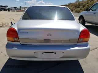 2001 Hyundai Sonata GLS с VIN KMHWF35V81A392523, выставлен на аукционе Copart как лот 74584334 с пробегом 174 597 миль миль и Списание • Salvage title. История ставок и продаж доступна на DreamBid. Изображение 6.