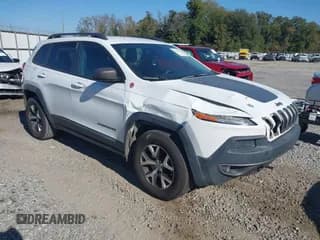 ✅ 2014 Jeep Cherokee Trailhawk • VIN: 1C4PJMBS9EW239763 • Lot: 43613520. Listed on IAAI with 122,929 mi. Free auction sales archive from the USA and detailed vehicle history report at DreamBid. Image 1.