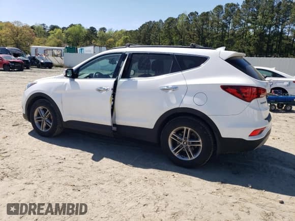 ✅ 2018 Hyundai Santa Fe 2.4L • VIN: 5NMZU3LB0JH060954 • Лот: 51750544. Опубликован ранее на Copart с пробегом 123 970 миль. Бесплатный доступ к архиву аукционных продаж из США и подробный отчёт об истории автомобиля на DreamBid. Изображение 2.