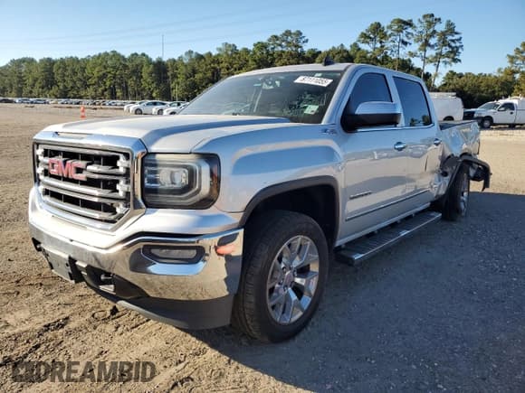 ✅ 2016 GMC Sierra 1500 SLT • VIN: 3GTU2NECXGG289289 • Lot: 87111055. Listed on Copart with 176,559 mi. Free auction sales archive from the USA and detailed vehicle history report at DreamBid. Image 1.
