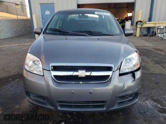 2007 Chevrolet Aveo LS z VIN KL1TD56677B075195, wystawiony jako Copart lot #84818114 z przebiegiem 98 549 mil mil oraz Szkoda całkowita • Salvage title. Historia ofert i sprzedaży dostępna na DreamBid. Obrazek 5.