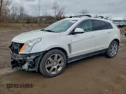 ✅ 2011 Cadillac SRX Premium Collection • VIN: 3GYFNFEY7BS634988 • Лот: 94653205. Опубликован ранее на Copart с пробегом 163 101 миль. Бесплатный доступ к архиву аукционных продаж из США и подробный отчёт об истории автомобиля на DreamBid. Изображение 1.