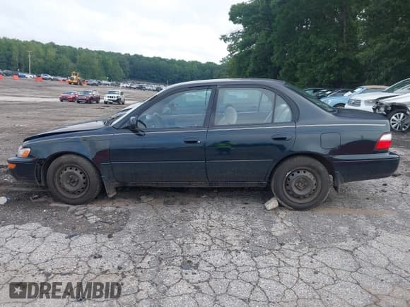 ✅ 1996 Toyota Corolla DX • VIN: 1NXBB02E6TZ449137 • Lot: 42811327. Wystawiony na IAAI z przebiegiem 323 970 mil. Bezpłatny archiwum sprzedaży aukcyjnych z USA i szczegółowy raport historii pojazdu na DreamBid. Zdjęcie 14.