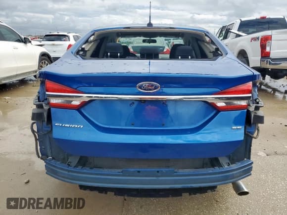 ✅ 2018 Ford Fusion SE • VIN: 3FA6P0H71JR114085 • Лот: 55527585. Опубликован ранее на Copart с пробегом 103 047 миль. Бесплатный доступ к архиву аукционных продаж из США и подробный отчёт об истории автомобиля на DreamBid. Изображение 6.