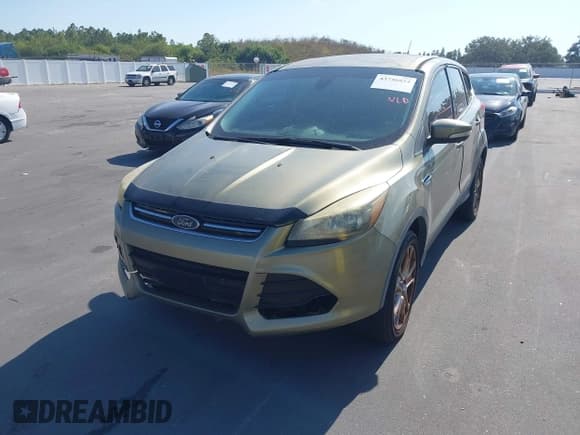 ✅ 2013 Ford Escape SEL • VIN: 1FMCU0HX6DUD64811 • Lot: 43746824. Listed on IAAI with 117,843 mi. Free auction sales archive from the USA and detailed vehicle history report at DreamBid. Image 2.