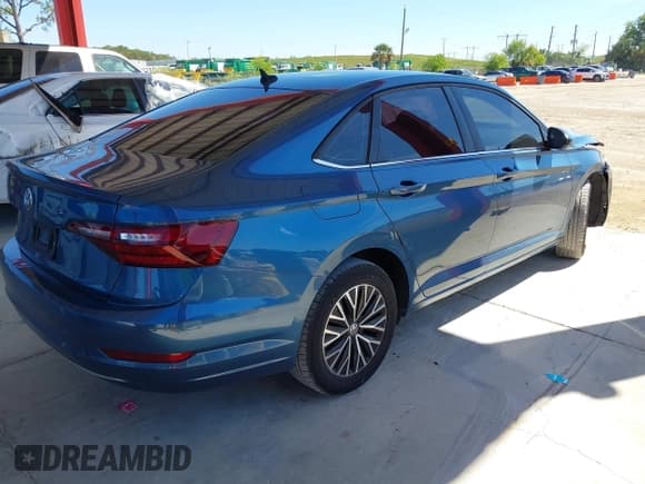 ✅ 2021 Volkswagen Jetta S • VIN: 3VWC57BU0MM038044 • Lot: 43451789. Listed on IAAI with 92,282 mi. Free auction sales archive from the USA and detailed vehicle history report at DreamBid. Image 4.