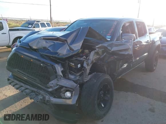 ✅ 2017 Toyota Tacoma SR5 • VIN: 5TFAZ5CN3HX042129 • Лот: 43415824. Опубликован ранее на IAAI с пробегом Не указан. Бесплатный доступ к архиву аукционных продаж из США и подробный отчёт об истории автомобиля на DreamBid. Изображение 2.