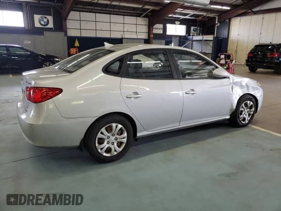 2009 Hyundai Elantra GLS z VIN KMHDU46D79U717424, wystawiony jako Copart lot #71997984 z przebiegiem 127 322 mil mil oraz Szkoda całkowita • Salvage title. Historia ofert i sprzedaży dostępna na DreamBid. Obrazek 3.