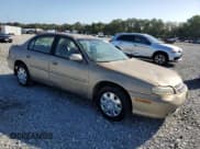 ✅ 2000 Chevrolet Malibu LS • VIN: 1G1NE52J3Y6259027 • Lot: 84865335. Listed on Copart with 87,728 mi. Free auction sales archive from the USA and detailed vehicle history report at DreamBid. Image 4.