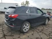 ✅ 2021 Chevrolet Equinox Premier • VIN: 2GNAXXEVXM6159397 • Lot: 82042275. Wystawiony na Copart z przebiegiem 57 213 mil. Bezpłatny archiwum sprzedaży aukcyjnych z USA i szczegółowy raport historii pojazdu na DreamBid. Zdjęcie 3.