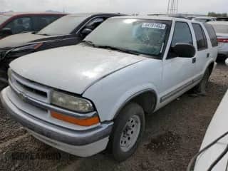 2001 Chevrolet Blazer LS z VIN 1GNCS13W91K247026, wystawiony jako Copart lot #64701453 z przebiegiem 250 681 mil mil oraz Czysty tytuł • Clean title. Historia ofert i sprzedaży dostępna na DreamBid. Obrazek 1.