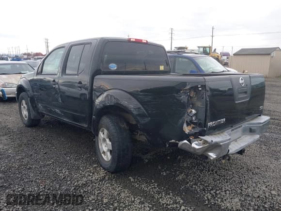 ✅ 2005 Nissan Frontier Nismo • VIN: 1N6AD07W55C411044 • Lot: 43599846. Listed on IAAI with 128,957 mi. Free auction sales archive from the USA and detailed vehicle history report at DreamBid. Image 3.