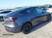 ✅ 2023 Tesla Model Y Long Range • VIN: 7SAYGDEE5PA099226 • Lot: 42004061. Listed on IAAI with 10,607 mi. Free auction sales archive from the USA and detailed vehicle history report at DreamBid. Image 4.