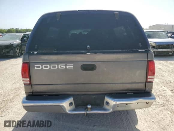 2002 Dodge Dakota with VIN 1B7GL12X32S716758, listed as a Copart auction lot 61710754 with 265,494 mi miles and Salvage title. Bid and sale history available at DreamBid. Image 6.