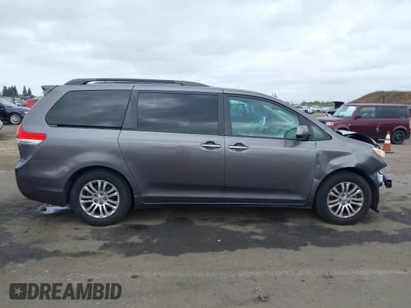 2011 Toyota Sienna XLE AAS with VIN 5TDYK3DC8BS059333, listed as a IAAI auction lot 43501915 with 173,775 mi miles and . Bid and sale history available at DreamBid. Image 13.