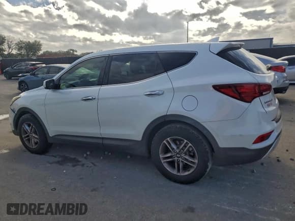 ✅ 2017 Hyundai Santa Fe 2.4L • VIN: 5XYZT3LB2HG403741 • Lot: 96082615. Wystawiony na Copart z przebiegiem 205 136 mil. Bezpłatny archiwum sprzedaży aukcyjnych z USA i szczegółowy raport historii pojazdu na DreamBid. Zdjęcie 2.