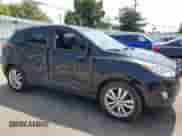 2012 Hyundai Tucson GLS z VIN KM8JU3AC5CU344709, wystawiony jako Copart lot #68502204 z przebiegiem 148 356 mil mil oraz Szkoda całkowita • Salvage title. Historia ofert i sprzedaży dostępna na DreamBid. Obrazek 4.