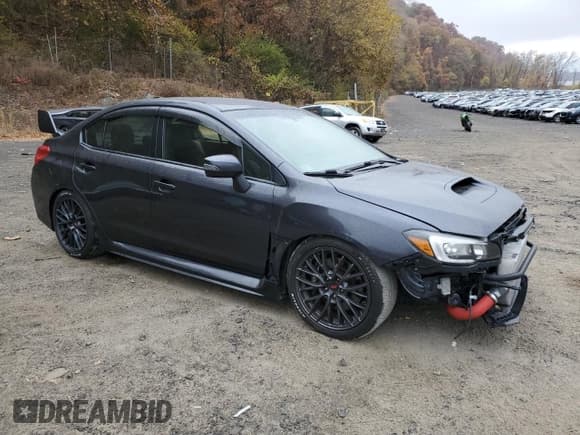 ✅ 2016 Subaru WRX STI • VIN: JF1VA2M66G9815165 • Lot: 77595524. Listed on Copart with 78,805 mi. Free auction sales archive from the USA and detailed vehicle history report at DreamBid. Image 4.