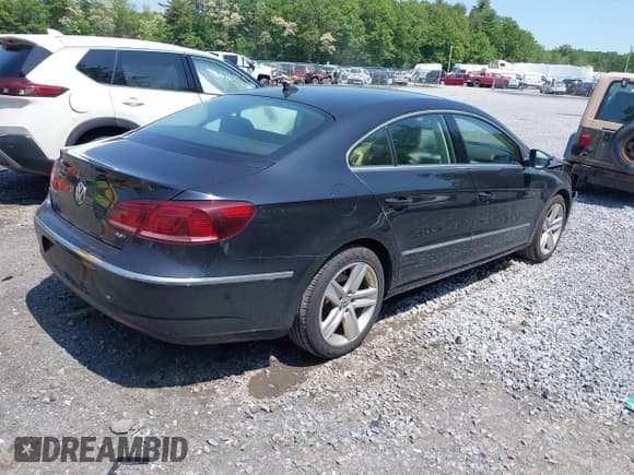 ✅ 2015 Volkswagen CC Sport • VIN: WVWBP7AN2FE828585 • Лот: 42410791. Опубликован ранее на IAAI с пробегом 143 056 миль. Бесплатный доступ к архиву аукционных продаж из США и подробный отчёт об истории автомобиля на DreamBid. Изображение 4.