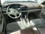 ✅ 2002 Mazda 626 LX • VIN: 1YVGF22C625301436 • Lot: 68753555. Listed on Copart with 147,202 mi. Free auction sales archive from the USA and detailed vehicle history report at DreamBid. Image 8.