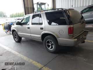 2005 Chevrolet Blazer LS z VIN 1GNCS13X85K109329, wystawiony jako IAAI lot #43278597 z przebiegiem 160 183 mil mil oraz . Historia ofert i sprzedaży dostępna na DreamBid. Obrazek 3.