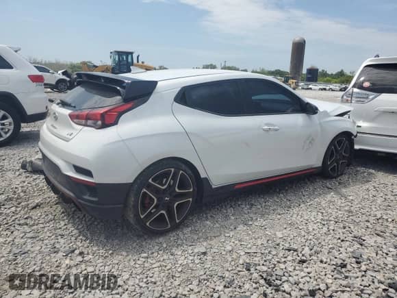 2020 Hyundai Veloster с VIN KMHT36AH6LU005899, выставлен на аукционе Copart как лот 67163814 с пробегом 106 668 миль миль и Списание • Salvage title. История ставок и продаж доступна на DreamBid. Изображение 3.