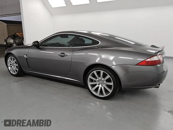 ✅ 2008 Jaguar XK • VIN: SAJWA43B785B27956 • Lot: 58368555. Listed on Copart with 108,505 mi. Free auction sales archive from the USA and detailed vehicle history report at DreamBid. Image 2.