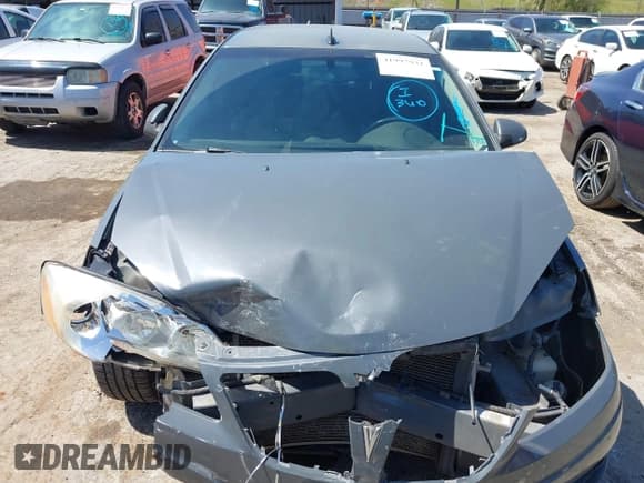 ✅ 2009 Pontiac G6 1SB • VIN: 1G2ZJ57K594262745 • Lot: 41997931. Listed on IAAI with 194,570 mi. Free auction sales archive from the USA and detailed vehicle history report at DreamBid. Image 12.