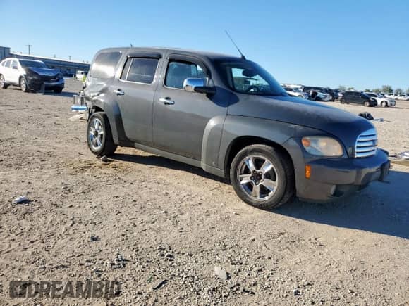2009 Chevrolet HHR 1LT with VIN 3GNCA23V39S601297, listed as a Copart auction lot 82561015 with 114,705 mi miles and Salvage title. Bid and sale history available at DreamBid. Image 4.