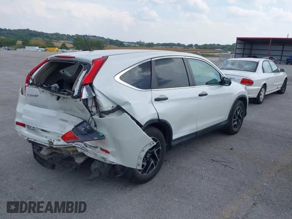 ✅ 2016 Honda CR-V SE • VIN: 5J6RM3H4XGL031716 • Лот: 43217157. Опубликован ранее на IAAI с пробегом 102 775 миль. Бесплатный доступ к архиву аукционных продаж из США и подробный отчёт об истории автомобиля на DreamBid. Изображение 4.