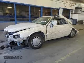 ✅ 2001 Cadillac Eldorado Touring ETC • VIN: 1G6ET12981B106400 • Lot: 42353495. Wystawiony na Copart z przebiegiem Nie podano. Bezpłatny archiwum sprzedaży aukcyjnych z USA i szczegółowy raport historii pojazdu na DreamBid. Zdjęcie 1.