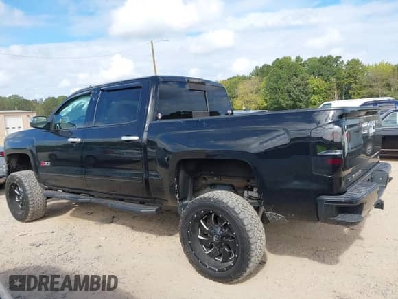 2015 Chevrolet Silverado 1500 LTZ with VIN 3GCUKSEC0FG390127, listed as a IAAI auction lot 43389295 with 120,442 mi miles and . Bid and sale history available at DreamBid. Image 14.