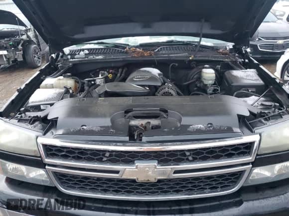 2006 Chevrolet Silverado 1500 LS z VIN 1GCEK19V76Z205081, wystawiony jako Copart lot #81746094 z przebiegiem 112 969 mil mil oraz Czysty tytuł • Clean title. Historia ofert i sprzedaży dostępna na DreamBid. Obrazek 11.