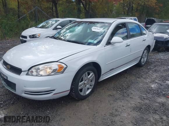 2016 Chevrolet Impala LT with VIN 2G1WB5E3XG1127706, listed as a IAAI auction lot 43407642 with 145,236 mi miles and . Bid and sale history available at DreamBid. Image 2.
