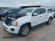 ✅ 2015 GMC Canyon 4WD SLT • VIN: 1GTG6CE3XF1263696 • Лот: 42725422. Опубликован ранее на IAAI с пробегом 104 599 миль. Бесплатный доступ к архиву аукционных продаж из США и подробный отчёт об истории автомобиля на DreamBid. Изображение 2.