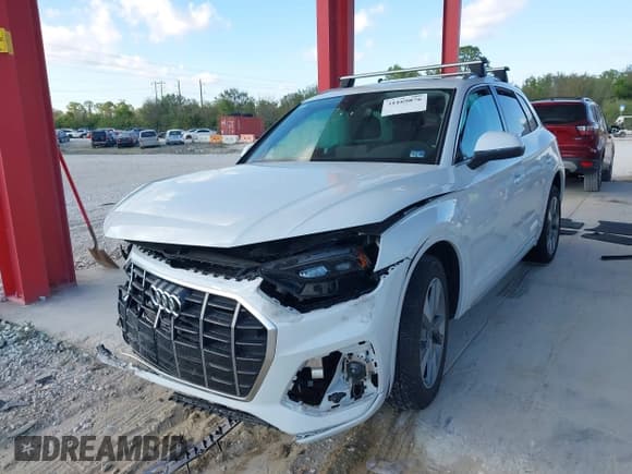 ✅ 2023 Audi Q5 Premium Plus • VIN: WA1BBAFY7P2024214 • Lot: 41169876. Listed on IAAI with 21,183 mi. Free auction sales archive from the USA and detailed vehicle history report at DreamBid. Image 2.