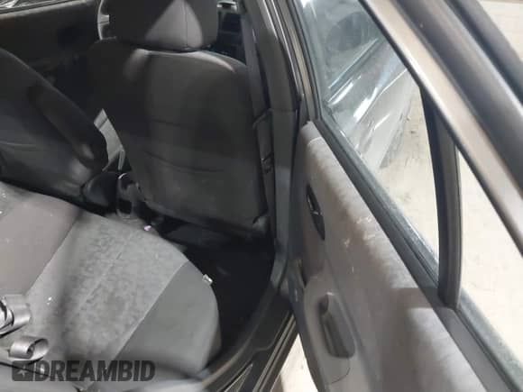 2004 Hyundai Accent GL z VIN KMHCG45C44U528783, wystawiony jako IAAI lot #41535104 z przebiegiem Nie podano mil oraz . Historia ofert i sprzedaży dostępna na DreamBid. Obrazek 8.