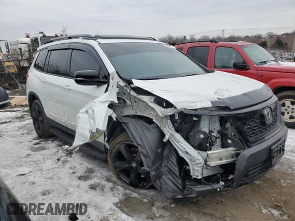 ✅ 2021 Honda Passport Elite • VIN: 5FNYF8H08MB026244 • Лот: 88502815. Опубликован ранее на Copart с пробегом 23 338 миль. Бесплатный доступ к архиву аукционных продаж из США и подробный отчёт об истории автомобиля на DreamBid. Изображение 4.