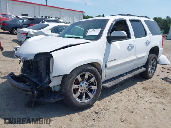 ✅ 2009 GMC Yukon SLT 4SB • VIN: 1GKFC33049R158367 • Lot: 42312248. Listed on IAAI with 220,033 mi. Free auction sales archive from the USA and detailed vehicle history report at DreamBid. Image 2.