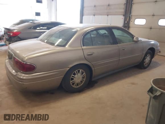 ✅ 2000 Buick LeSabre Limited • VIN: 1G4HR54K9YU152165 • Lot: 42666462. Wystawiony na IAAI z przebiegiem 219 978 mil. Bezpłatny archiwum sprzedaży aukcyjnych z USA i szczegółowy raport historii pojazdu na DreamBid. Zdjęcie 4.