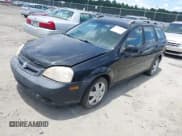 ✅ 2007 Suzuki Forenza • VIN: KL5JD86Z97K667621 • Lot: 42611083. Listed on IAAI with 111,284 mi. Free auction sales archive from the USA and detailed vehicle history report at DreamBid. Image 2.