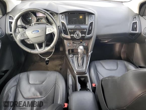 ✅ 2016 Ford Focus Titanium • VIN: 1FADP3N20GL249535 • Лот: 93452785. Опубликован ранее на Copart с пробегом 57 259 миль. Бесплатный доступ к архиву аукционных продаж из США и подробный отчёт об истории автомобиля на DreamBid. Изображение 8.